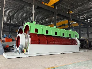 Saringan trommel dengan pisau pembuka kantong bagian dalam